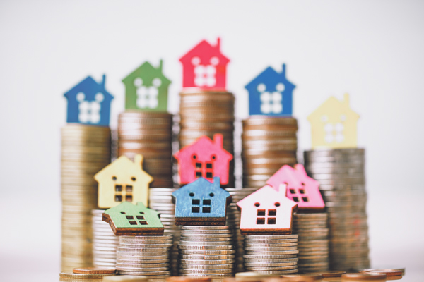 Immobilienwirtschaft Münzen Geld Häuser 